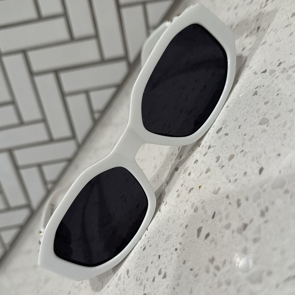 White Versace sunglasses in perfect condition.